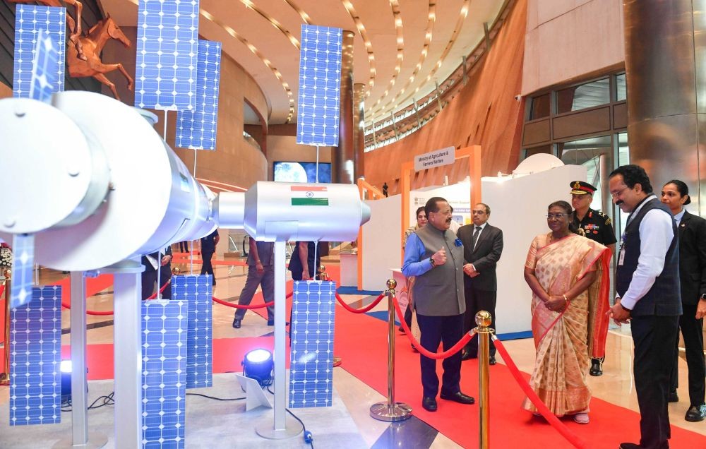 The President of India, Droupadi Murmu, along with Minister of State (Independent Charge) Dr Jitendra Singh and ISRO Chairperson, S Somanath took a walkthrough of exhibition showcased on the India’s First National Space Day - 2024 celebrations at Bharat Mandapam, in New Delhi on August 23. (PIB Photo)
